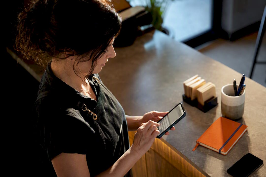 Business owner responding to a customer text